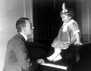 Rachmaninoff plays for his granddaughter, Sophie. 1927. AP Photos
